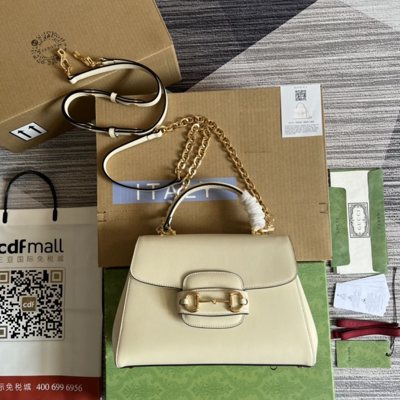 G*u*i top handle bags